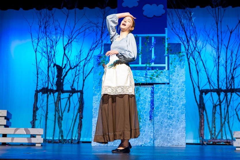 Students perform onstage